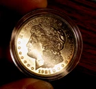 MORGAN SILVER DOLLAR 1921 D AU+ IN HARD PLASTIC CASE 90% SILVER DOLLAR