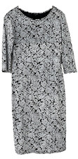 STELLA MORGAN. BLACK/WHITE PRINTED STRETCHY JERSEY DRESS. 3/4 SLEEVES. SIZE 12