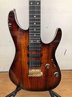 Ibanez AZ47P2K Dragoneyeburst used electric guitar with gold hardware, black pickguard, and three single-coil pickups.