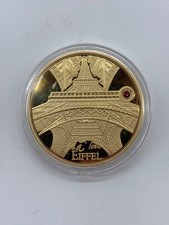 Pièce commémorative dorée Tour Eiffel monuments français collection capsule