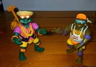 Vintage Teenage Mutant Ninja Turtles Sewer Spitting Figure Lot Of 2