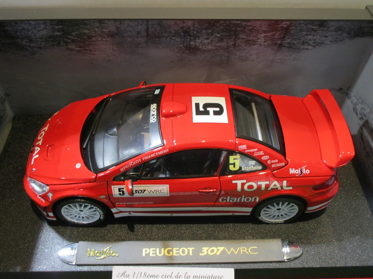 PEUGEOT 307 WRC RALLYE # 5 GRONHOLM rouge au 1/18 MAISTO
