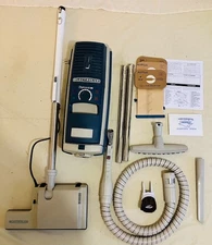 ELECTROLUX CANISTER VACUUM W/ NEW HOSE,BRUSHROLL, MTR. BEARINGS, REFURBISHED