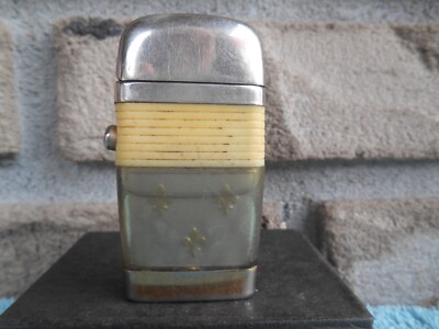 VINTAGE SCRIPTO VU SMALL LIGHTER WHITE BAND WITH FLEUR DE LIS SYMBOLS