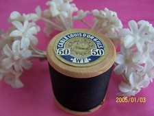 Ancienne bobine en bois LOUIS D'OR. Noir. Fil câblé 6 brins. 457mètres.  N°412