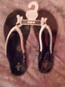 black jelly flip flops