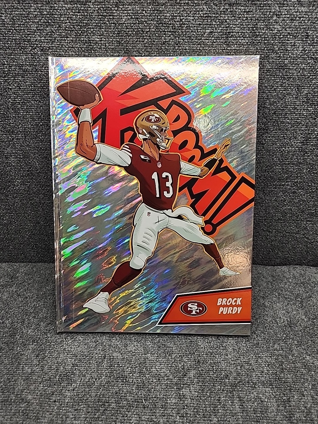 Brock Purdy #24 Football Cards 2024 Panini Absolute Kaboom Vertical trading card — raw and PSA graded price guide