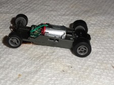 AFX MEGA G HO SLOT 1.7 Long NARROW CHASSIS GRAY 5 SPOKE RIMS AND TIRES RED Can