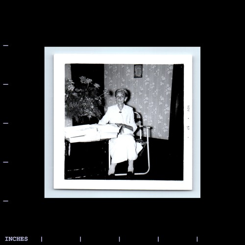 Old Square Photo OLDER WOMAN SITTING ON CHAIR TACKY WALLPAPER 1957 eBay