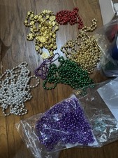 Mardi Gras BEADs 25 Strands of beads different colors plus bead with a gold disc