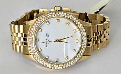 $99 MSRP-  Anne Klein 12/7742MPGB York Stainless Gold-Tone Watch MOP Dial