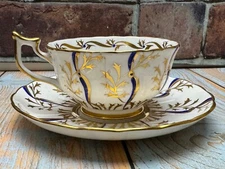 Royal Chelsea “Regal” Gold And Blue Footed Cup And Saucer Set 