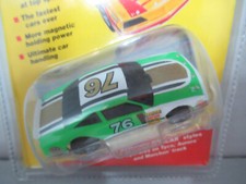 NEW LIFELIKE WHITE/GRN/GOLD 76 STOCKER HO SLOT CAR