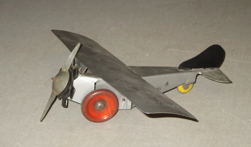 1930'S GIRARD- WIND-UP MONOPLANE-13" WING SPAN-TIN ANTIQUE TOY- MARX- WORKS-EXC