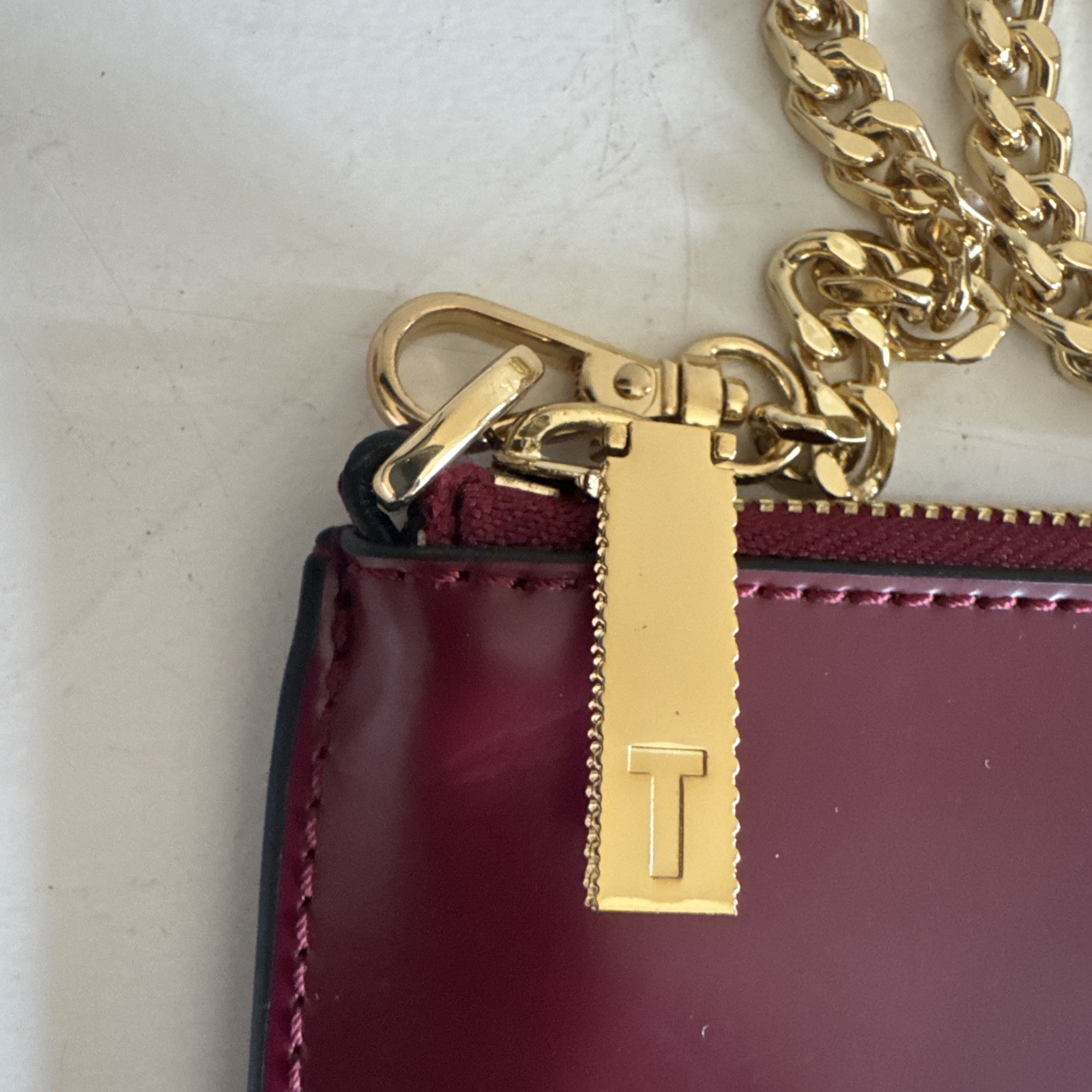 Ted Baker GRETAA Geometric Bow Leather Crossbody Oxblood Red Maroon Gold Strap image 7