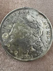 1921 P  Morgan Silver Dollar $1-Philadelphia Mint (No Mint Mark)–Circulated 90%