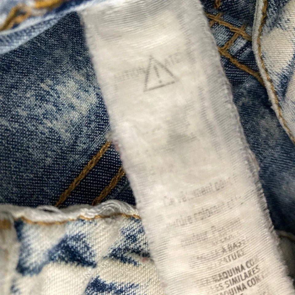 Pantalones de mezclilla elásticos vintage de mezclilla azul lavado con ácido para mujer 31 detalles con flecos Foto 4 de 4