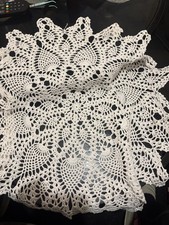 white crocheted lace doily