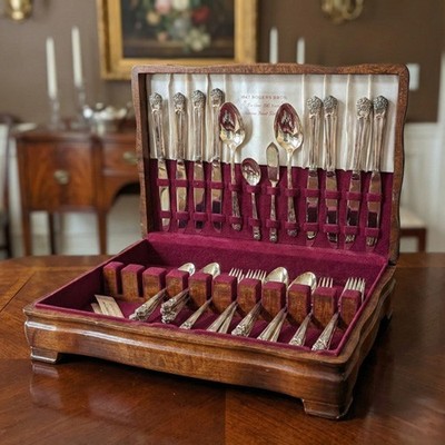 Vintage 1847 Rogers Bros. silverplate flatware set in original wooden case