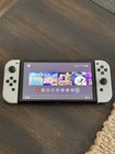 Nintendo Switch OLED Model HEG-001 Handheld Console - 64GB - White — photo 3