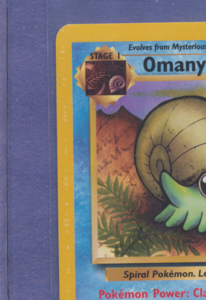 ERROR 1999 Pokemon Fossil Omanyte 52/62 PD in Left Border MINT