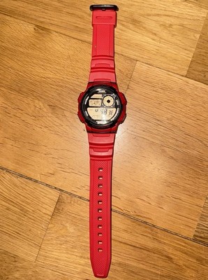 CASIO Herrenarmbanduhr AE-1000W 4AV Rot, Weltzeit, 100m Wasserdicht