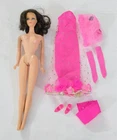 X-844 VINTAGE 1960'S MATTEL BARBIE TNT BRUNETTE DOLL WITH TAGGED CLOTHING