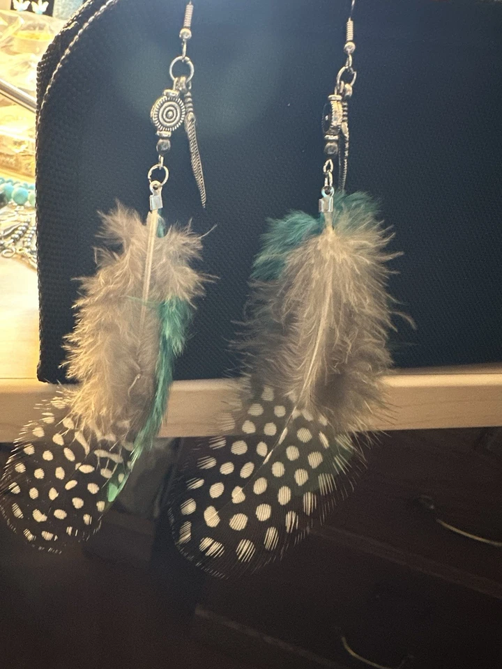 Pendientes colgantes de plumas de plata Foto 2 de 2