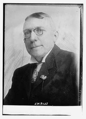 Photo:J.W. Riley Portrait Man in Suit with Glasses