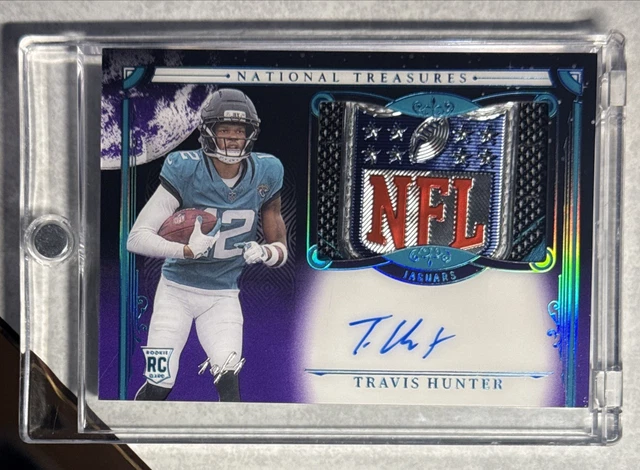 2025 National Treasures TRAVIS HUNTER 1/1 RPA NFL LOGOMAN SHIELD ON CARD AUTO RC