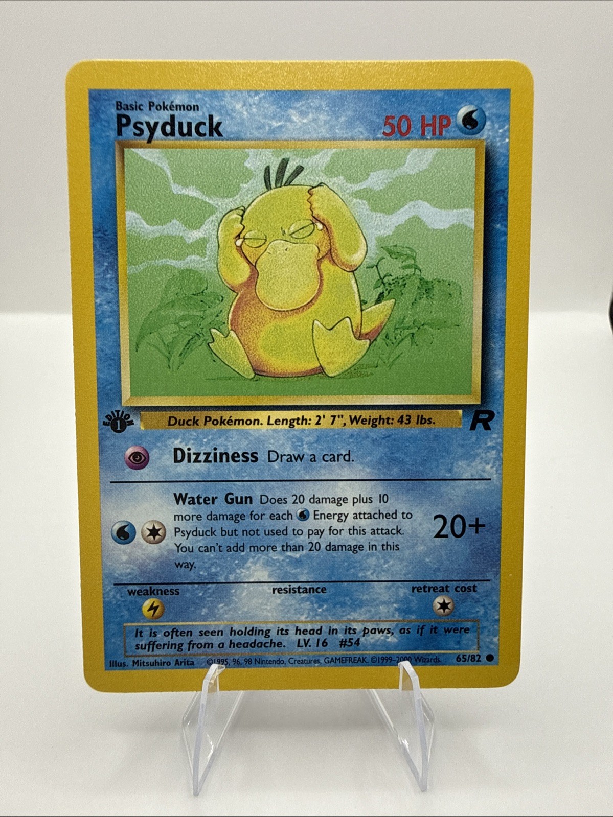 Pokemon 1st Edition Psyduck 65/82 Pokémon Team Rocket WOTC 2000 NM/MT Rare Vtg