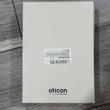 Oticon Desktop Charger With Power Cable, Wall Adapter, Manual.