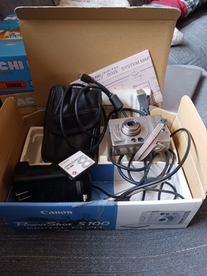 Canon Digital ELPH Camera PowerShot S100  Case Battery Extras 
