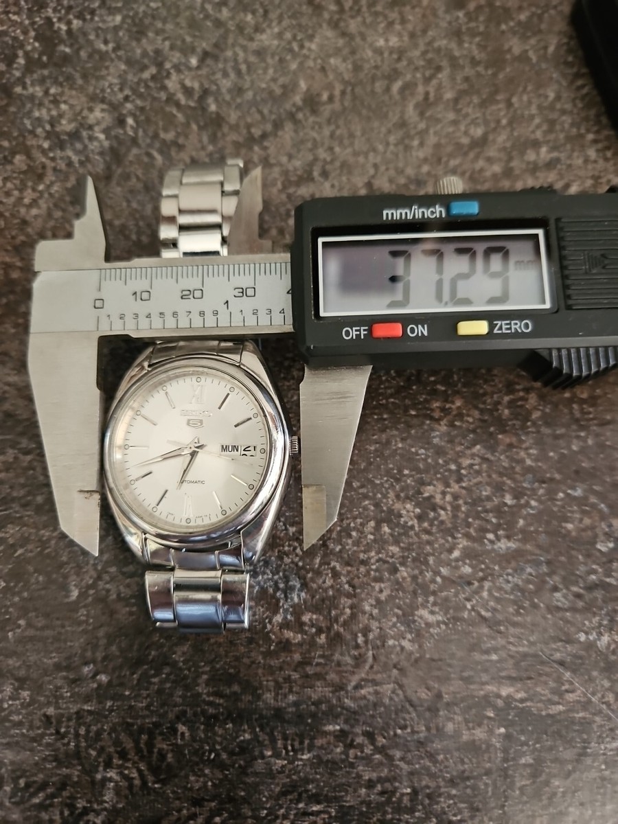 Seiko 5 Automatic 7S26-0430 Silver Dial Day Date Watch. See