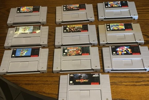 10 Nintendo SNES Game Lot: Donkey Kong, Mortal Kombat, Tetris, Plok, Super Mario