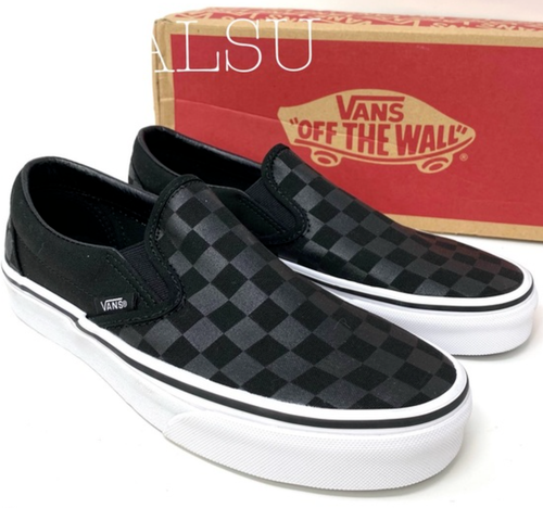 black low top checkered vans