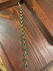 Gold plated emerald temnis bracelet estate jewelry