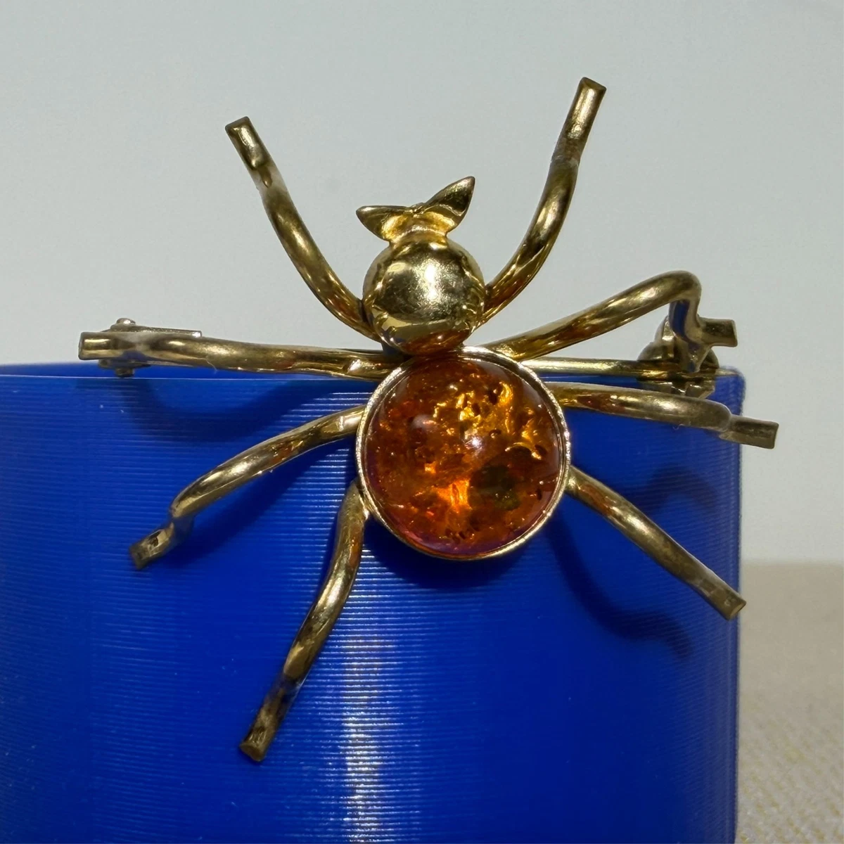 Spinnenbrosche mit Bernsteinkörper, 50/60er Jahre, kein Gold, L:~3,5cm