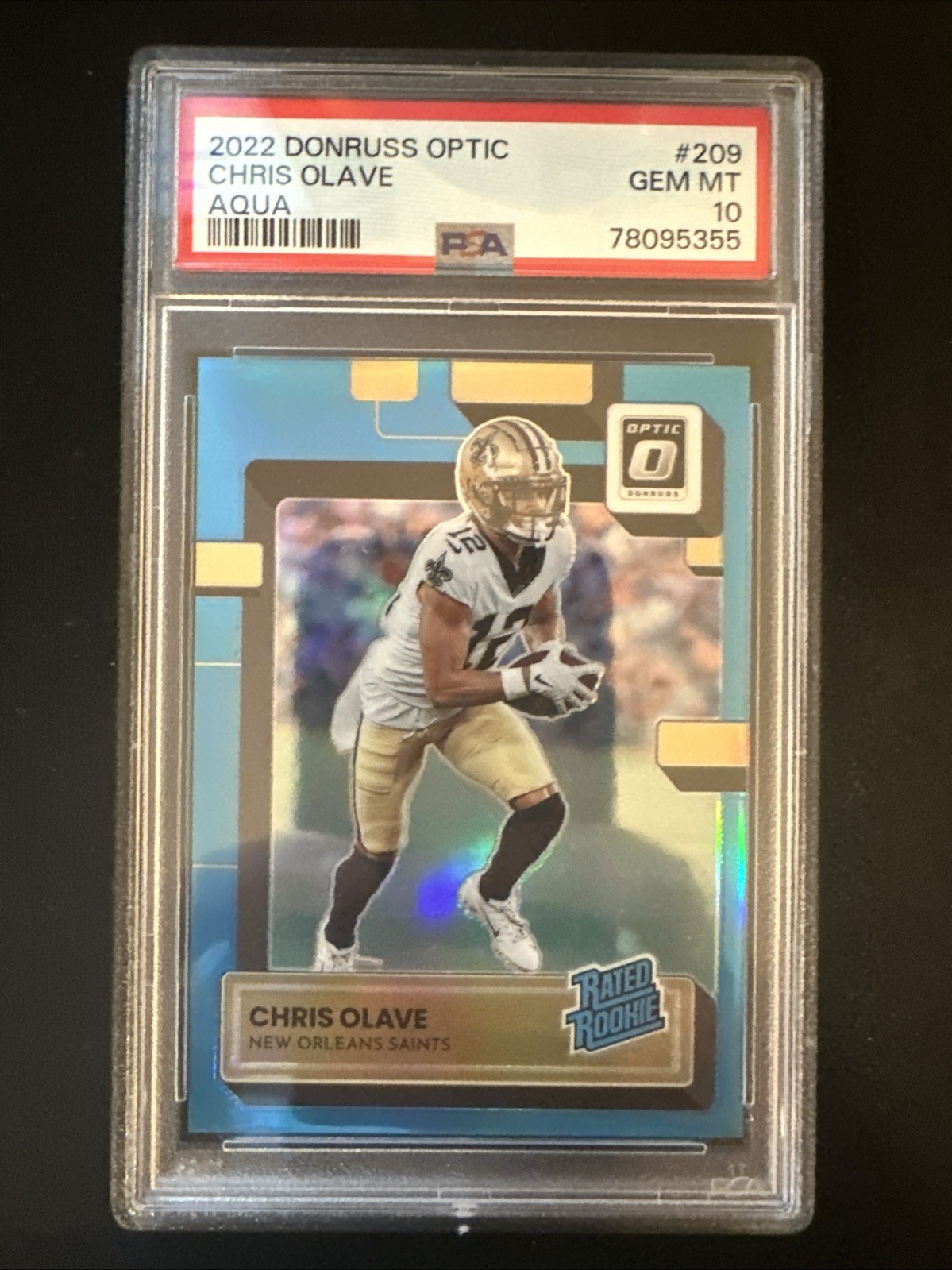 2022 Donruss Optic 209 Chris Olave Rated Rookie Aqua Prizm RC Saints /299 PSA 10