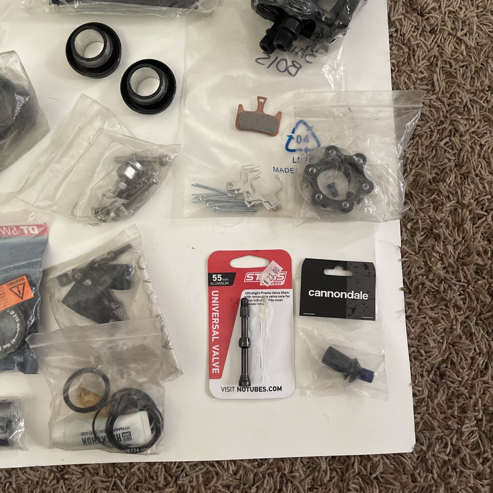 Lot of different bike parts some used some new package deal for everything 