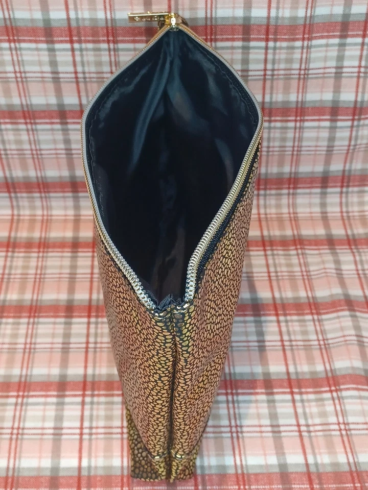  Bolsa de Maquillaje Tarte Gold-Getter Edición Limitada  Foto 2 de 4