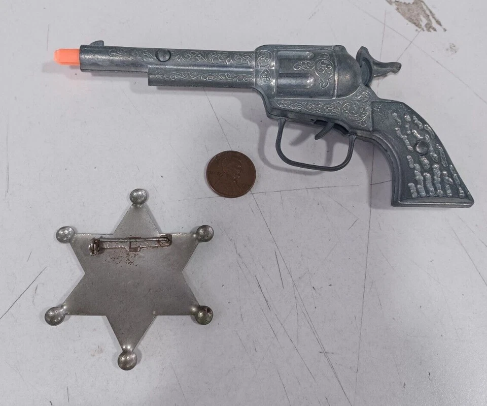 Pistola revólver y pasador sheriff de juguete para niños de 2,5" Foto 2 de 3