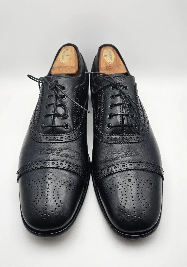 Salvatore Ferragamo Black Wingtip Dress Shoes for Men for  display picture 1