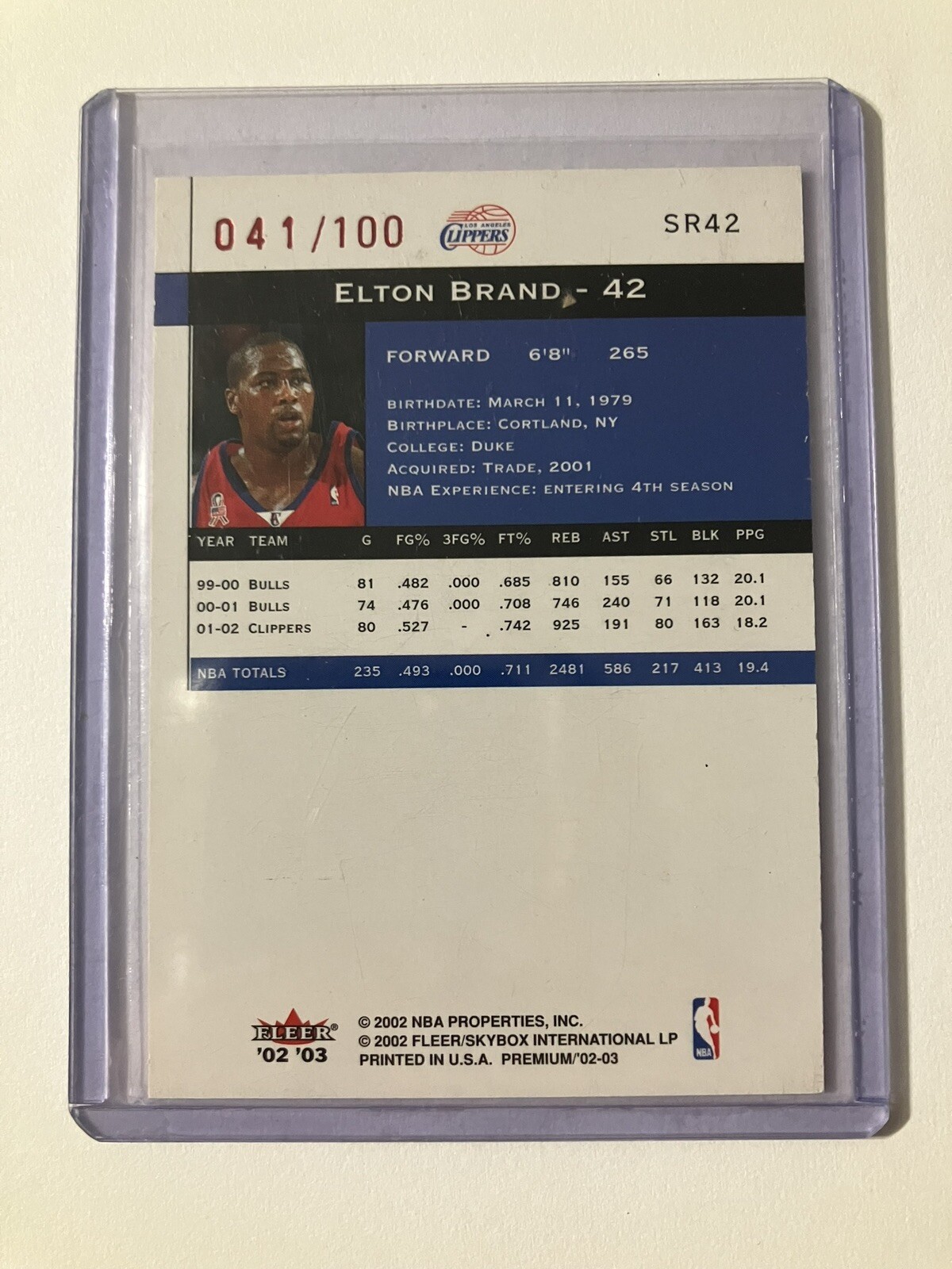 200203 Fleer Premium Red Clippers Basketball Card 42 Elton Brand /100