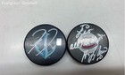 Lot of 2 Autographed Hockey Pucks-No Coa