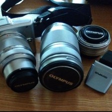 Olympus PEN mini E-PM1 Mirrorless Camera Silver with Lenses and Accessories