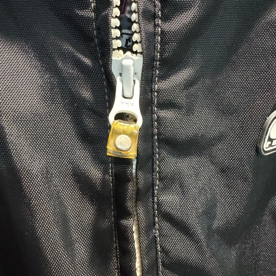 Chaqueta de moto de nieve en blanco y negro Foto 4 de 4