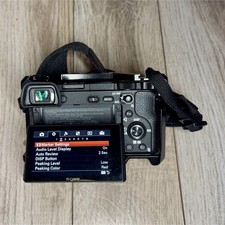 Sony A6300 Mirrorless Camera Body + 4 Batteries + Cage + Charger (4K Video)