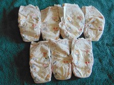 7 Target Up  Up Size 8 Diapers, 1 Huggies Snug  Dry Size 7 Diapers, 8 Total