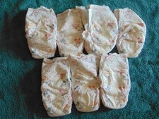 7 Target Up & Up Size 8 Diapers, 1 Huggies Snug & Dry Size 7 Diaper, 8 Total